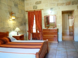 MARGIA holiday house double bedroom with patio and with en suite bathroom